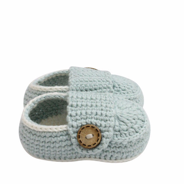 Crochet baby shoes top made by hand